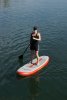 Woman On Paddle Board