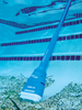 Close Up Of Pool Blaster® Aqua Broom In Swimming Pool