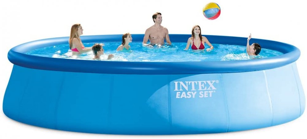 Family Playing In A Intex Easy Set Swimming Pool